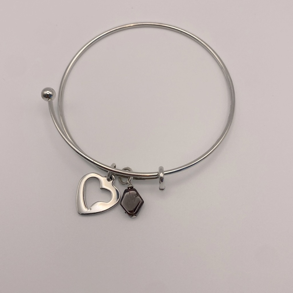Stainless steel bangle with garnet and heart charm